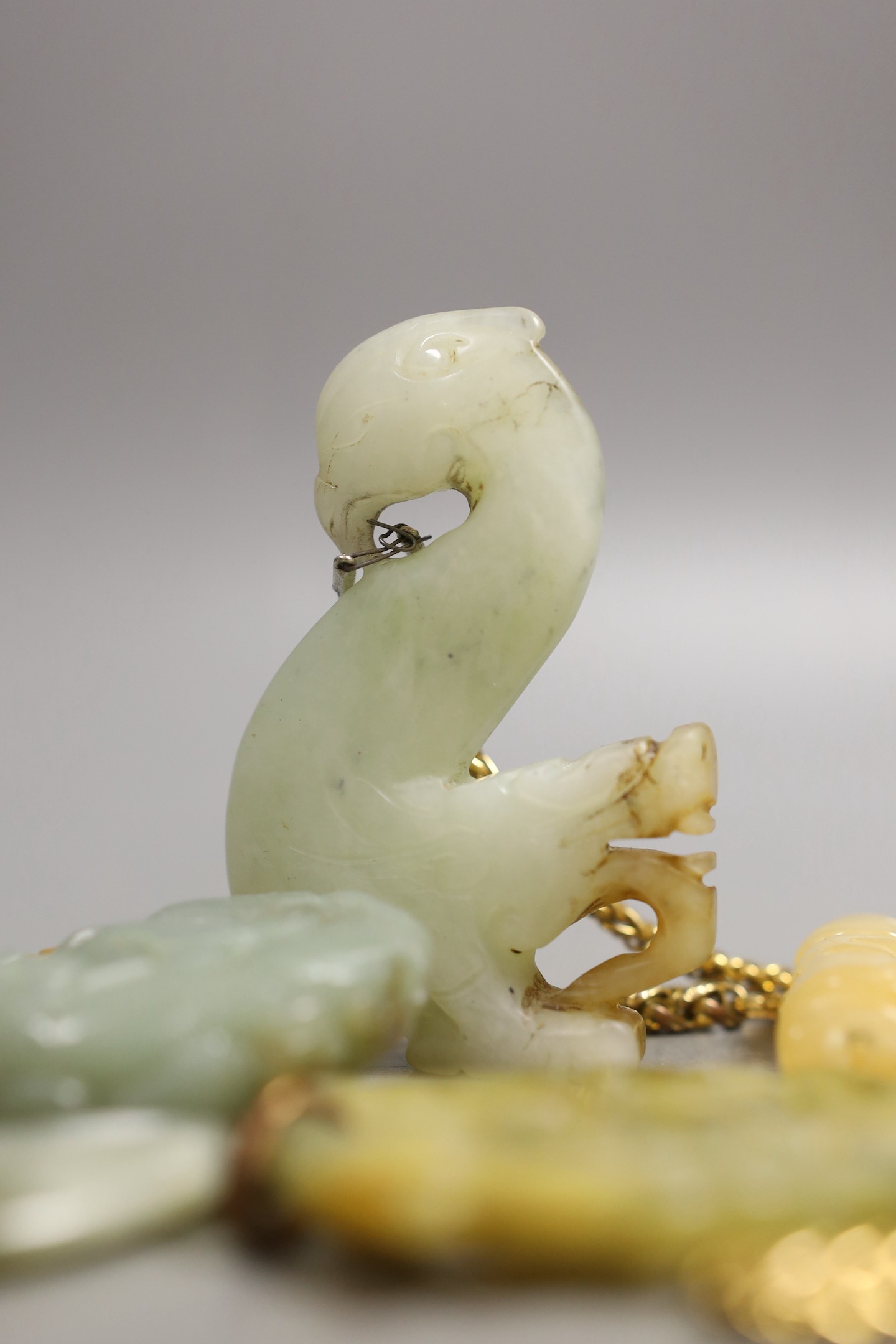 A group of Chinese Jade and hardstone carvings, plaques and figures, largest 8.2 cm (9)